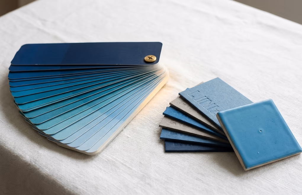 Brand color swatches and typography samples arranged on a design board