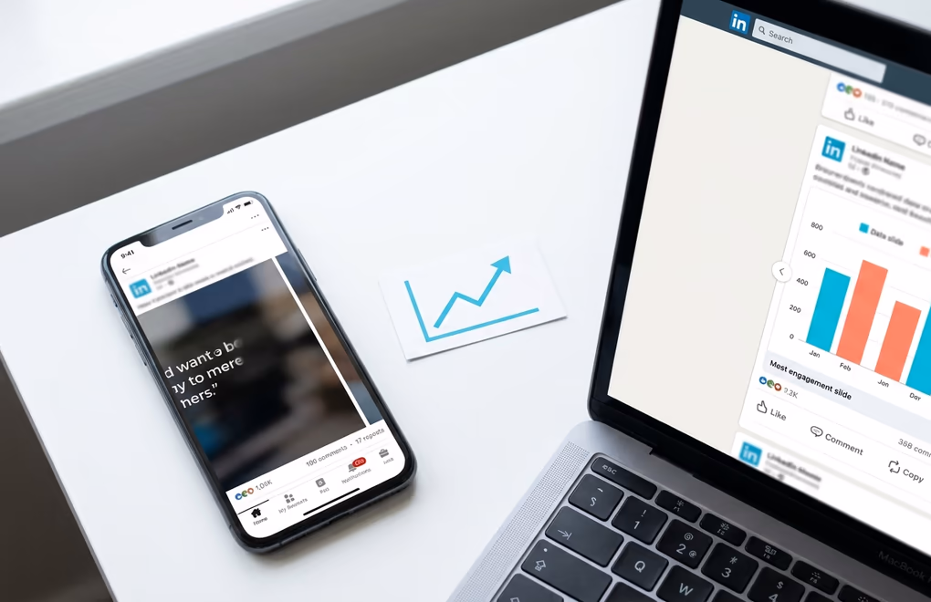 LinkedIn carousel post examples with engagement metrics visible on a phone and laptop screen